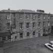 Elevated view from NNE of rear of original school