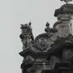 Detail of sculpture on gable above main entrance.