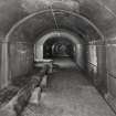 Tank access tunnel, view of interior from East.