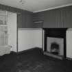 No 32 Interior. First floor. NW room 18 pane sash window and fireplace