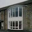 NE Side. Bay window. Detail.