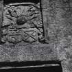 Detail of armorial panel in porch.