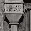 Duntrune Castle.
Detail of specimen rainwater head, date on head: '1957'.
