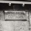 Glasgow, Victoria Park Street.
View of inscription.
Insc: 'Livingstone Cottages'.