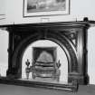 Interior, dining room, detail of black marble fireplace
