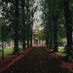 View from WSW showing avenue leading to church