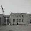 View of vehicle entrance and administration block from E.