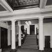 Interior.
View of E staircase in entrance hall from W.