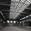 Interior.
Viewof central bay of Fabrication and Heat Treatment department, showing Belfast roof trusses.