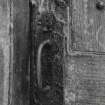 Detail of latch plate on doorway in North elevation.