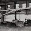 Main Fabrication Shop.
View of frame bending machine lifting beam.