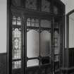 Interior. Detail of internal leaded glass doors of vestibule