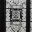 Interior. Detail of staircase stained glass window.