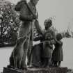 Fingask Castle, statuary.
General view of sculpture in grounds showing a family with a dog.