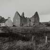 House, ruinous castle and steading, general view from SW