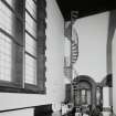 Interior, view of metal spiral staircase from original gallery to attics