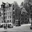 General view from SE of Nos 96-110 Grassmarket, and police box, Nos 95-107 West Bow, and Bow Foot Well.