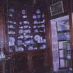 Interior.
View of china display shelves.