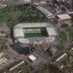 Glasgow, Parkhead, oblique aerial view, taken from the SW, centred on Celtic Park football stadium, and showing the Eastern Necropolis graveyard in the top half of the slide.