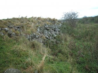 View of stone capping along E side of bunker