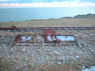 View from the N of tank shaped target with tracked target beyond