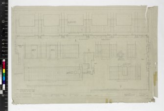 Details of faience tiles to walls of machine shop.