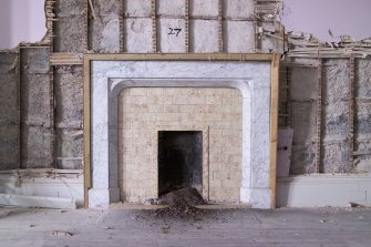 Interior.  1st floor, detail of specimen fireplace