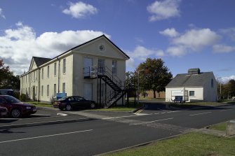 View.  Domestic site, 1935 design barrack block 'Drummond' from NE.