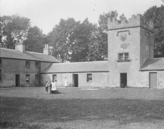 View of service court yard and clock tower, Inchrye Abbey.
