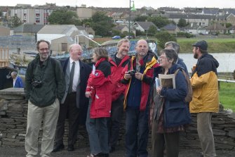 Thurso Old Town. Some Commissioners, John Hume and some RCAHMS staff sharing a joke