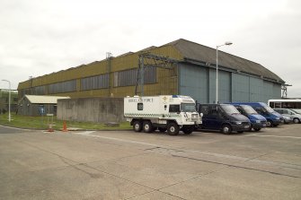 View.  Type C aircraft hangar from NW.