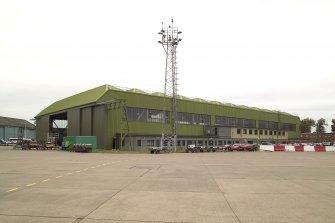 View.  Type C aircraft hangar with side offices from S.