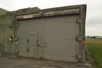 Detail.  Dispersal site showing armoured doors for store at side of hardened bombproof aircraft shelter.