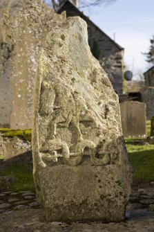 Churchyard. Pictish cross slab. NW Face.