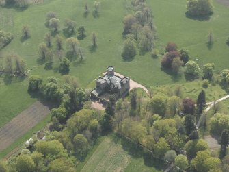 Oblique aerial view centred on the country house, taken from the NNE.