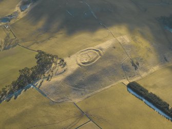 Oblique aerial view centred on the remains of the fort and settlement, taken from the N.