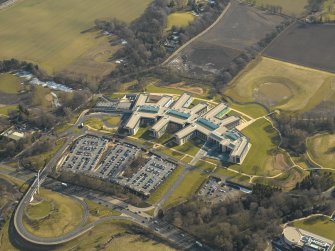 Oblique aerial view of the offices, taken from the NW.