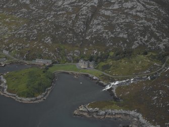 Oblique aerial view centred on the country house, taken from the SW.