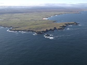 General oblique aerial view centred on the lighthouse and buildings, taken from the NW.