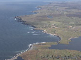 General oblique aerial view across the crofting township and Barvas Sands, taken from the SW.