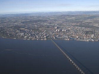 General oblique aerial view looking across the Firth of Tay and the road bridge towards the city of Dundee, taken from the SSE.
