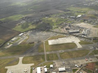 General oblique aerial view of the airport, taken from the NNE.