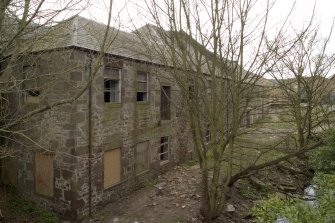 View of original mill building from N