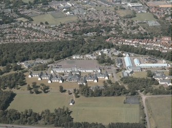 Oblique aerial view centred on the Barracks, taken from the S.