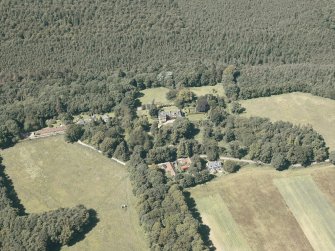 Oblique aerial view of the country house and policies, taken from the SE.