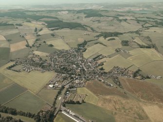General oblique aerial view of the village, taken from the SE.