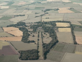 General oblique aerial view of the country house and policies, taken from the SE.