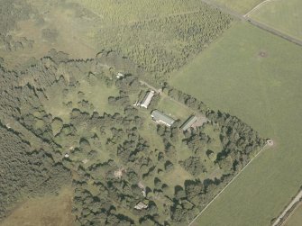 Oblique aerial view centred on the remains of the radar station, taken from the WNW.