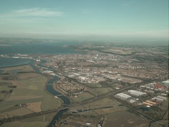 General oblique aerial view of the oil refinery, taken from the W.