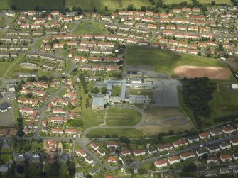 Oblique aerial view centred on the academy, taken from the SSE.
